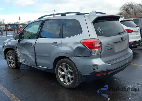 2017 Subaru Forester 2.5I Touring z USA, uszkodzony, nr VIN JF2SJAWC9HH559512